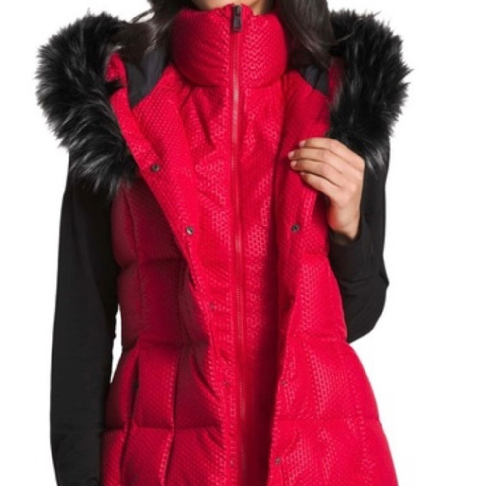 North Face long vest. Worn once. Beautiful warm long parka style vest!